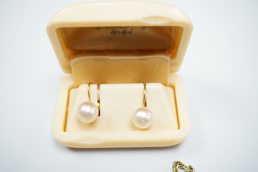 Two coral necklaces and a group of costume jewels, comprising: two coral bead necklaces, each with a gold clasp, combined gross weight approximately 35 grams; together with a simulant pearl necklace and pair of earrings